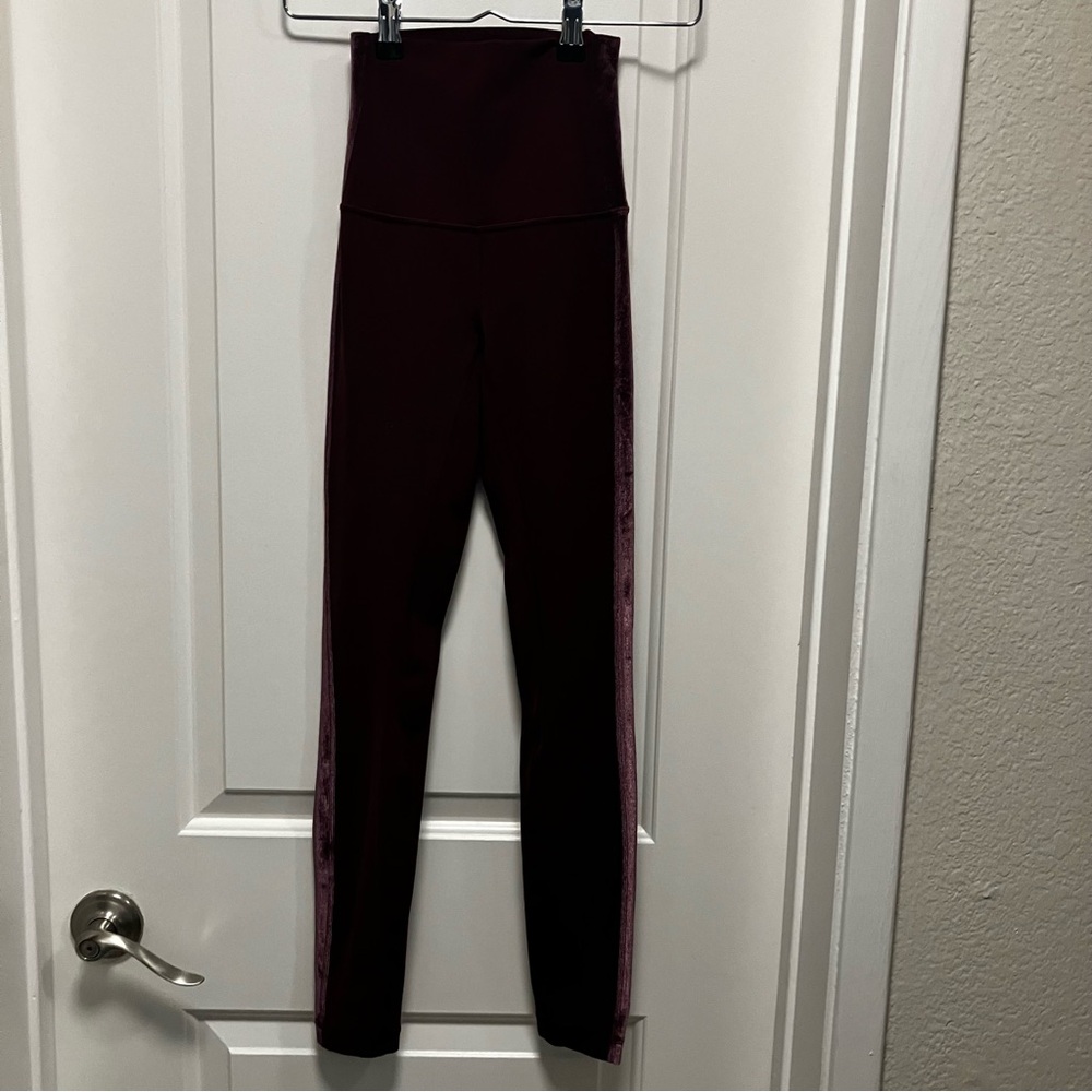 Lululemon women’s size 0 burgundy leggings with velvet strip down the sides